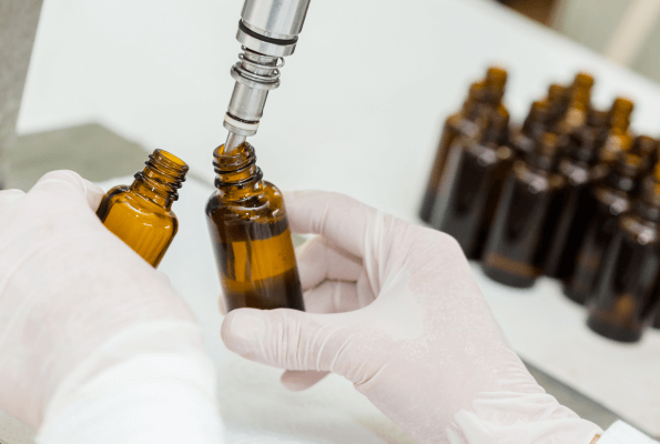 filling-the-bottle-with-syrup